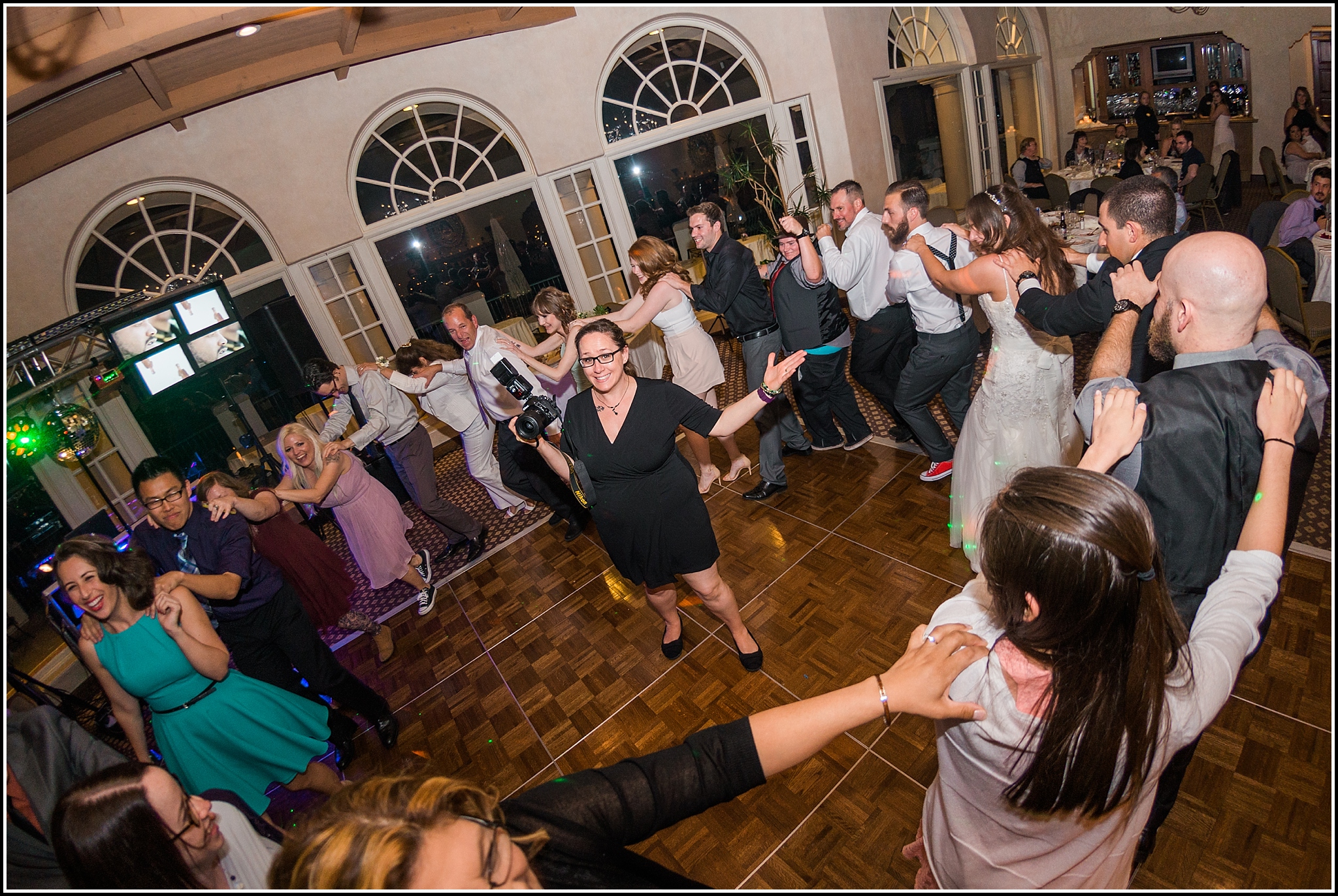  favorite wedding images 2016, wedding photos from 2016, our favorite wedding photos, stuck in the conga line, wedding reception fun