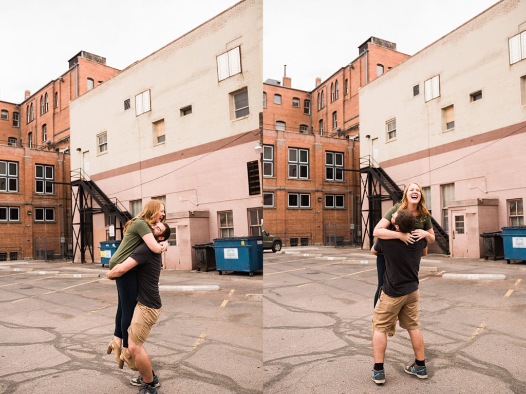 man spinning his fiancé around