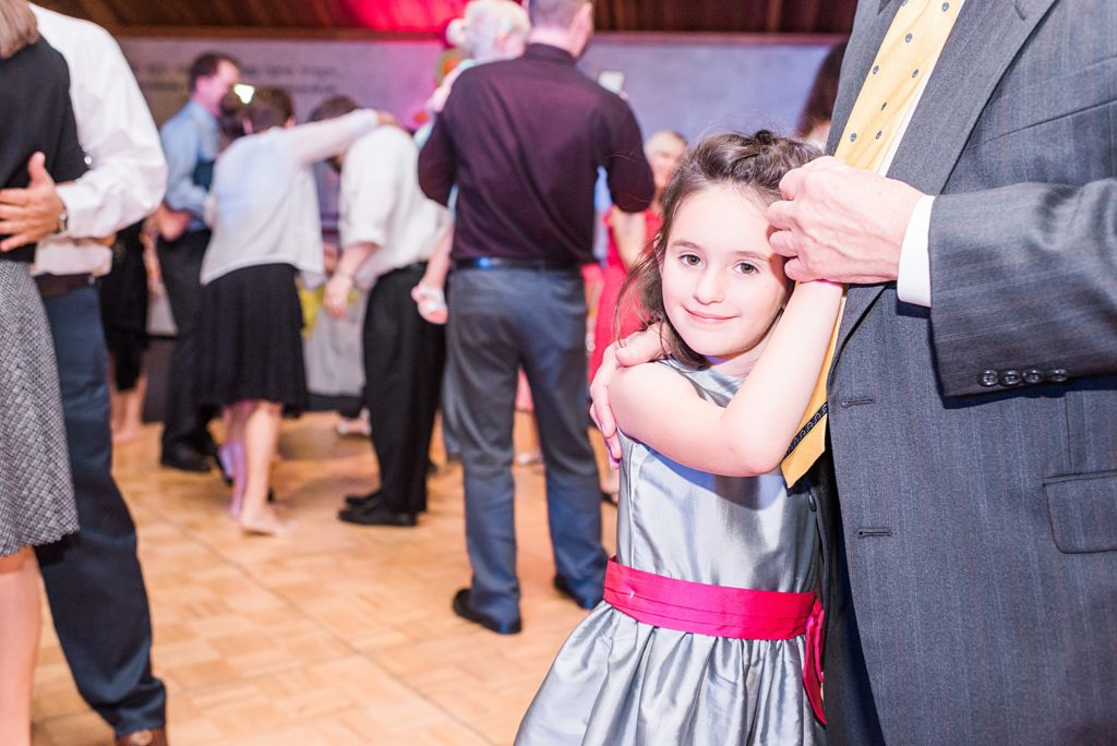 little girl dancing with grandfather