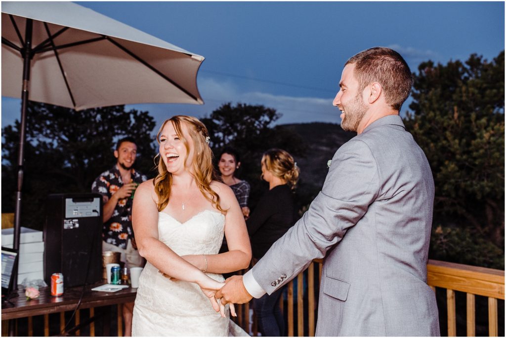 guests dancing outdoor cabin wedding south fork colorado