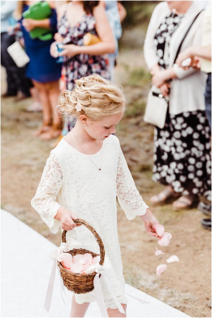flower girl tossing petals