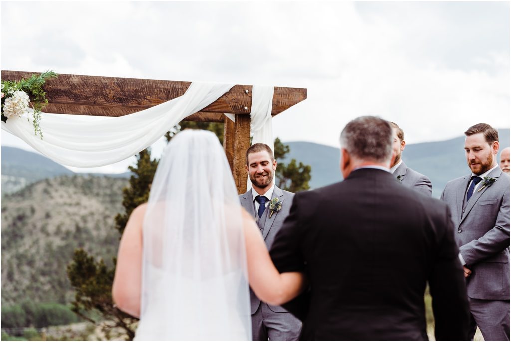 bride being walked down the aisle