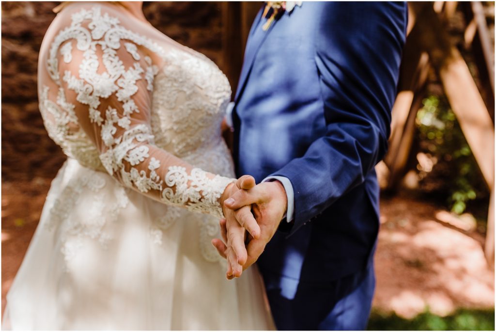 bride and groom holding hands