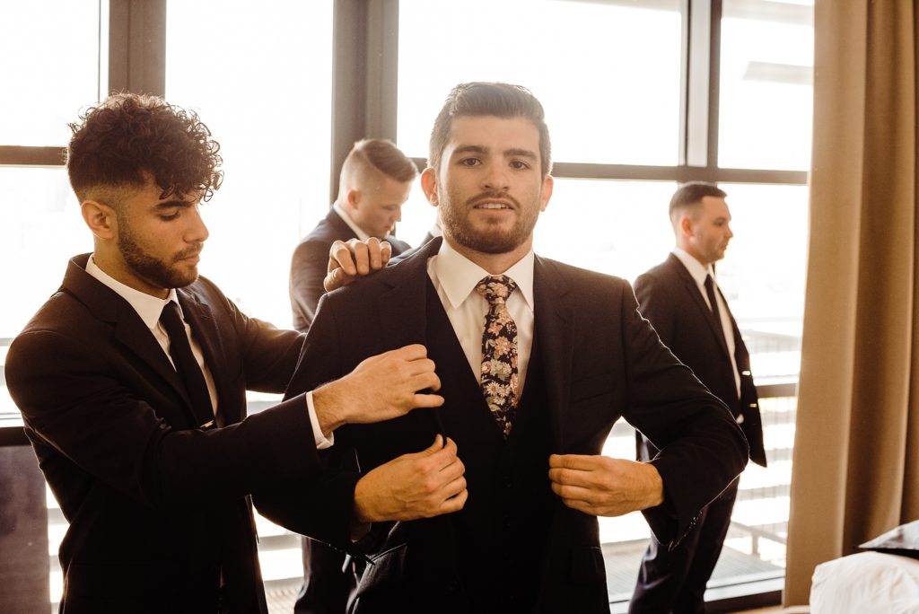 groom getting dressed
