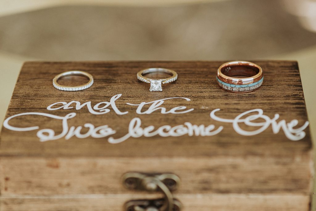 wedding rings on a custom wood box