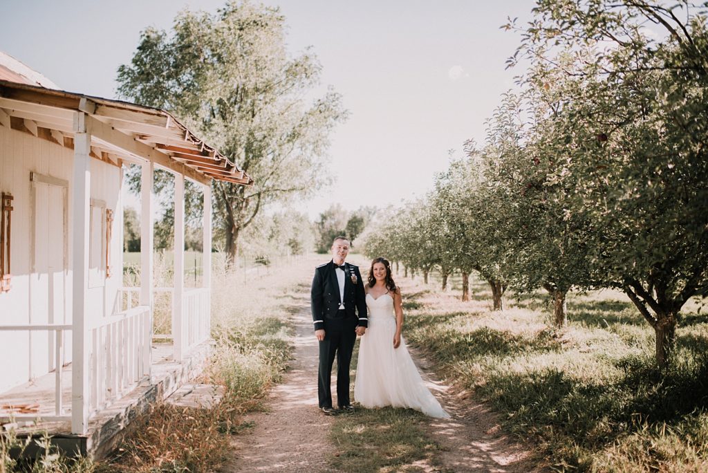 wedding day first look at an apple orchard