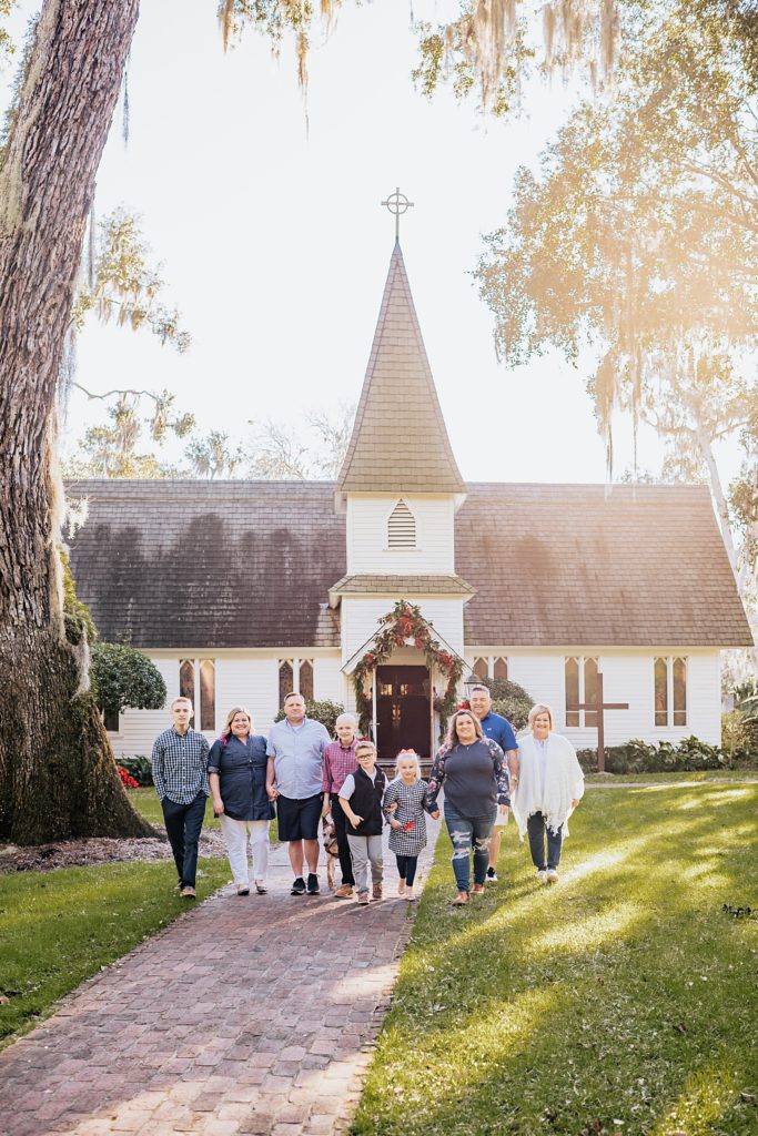 big family photo in front of christ church fredericka