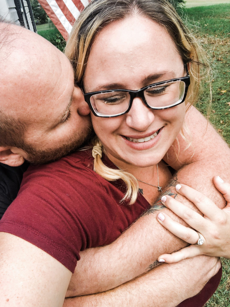 randy kissing ashley on the cheek
