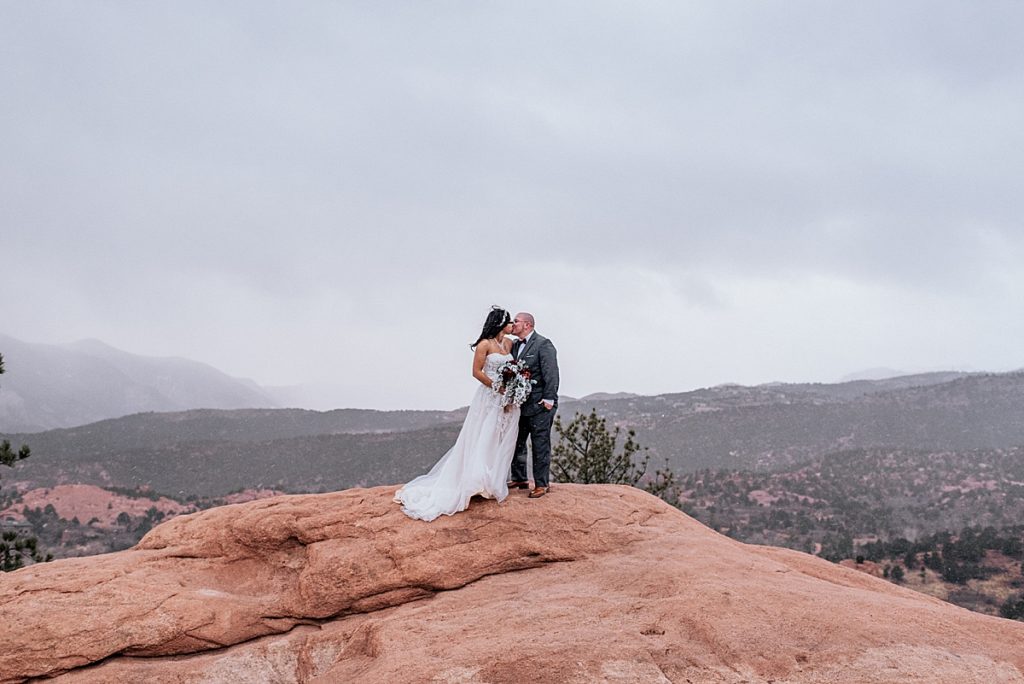 bride and groom at high point at garden of the gods