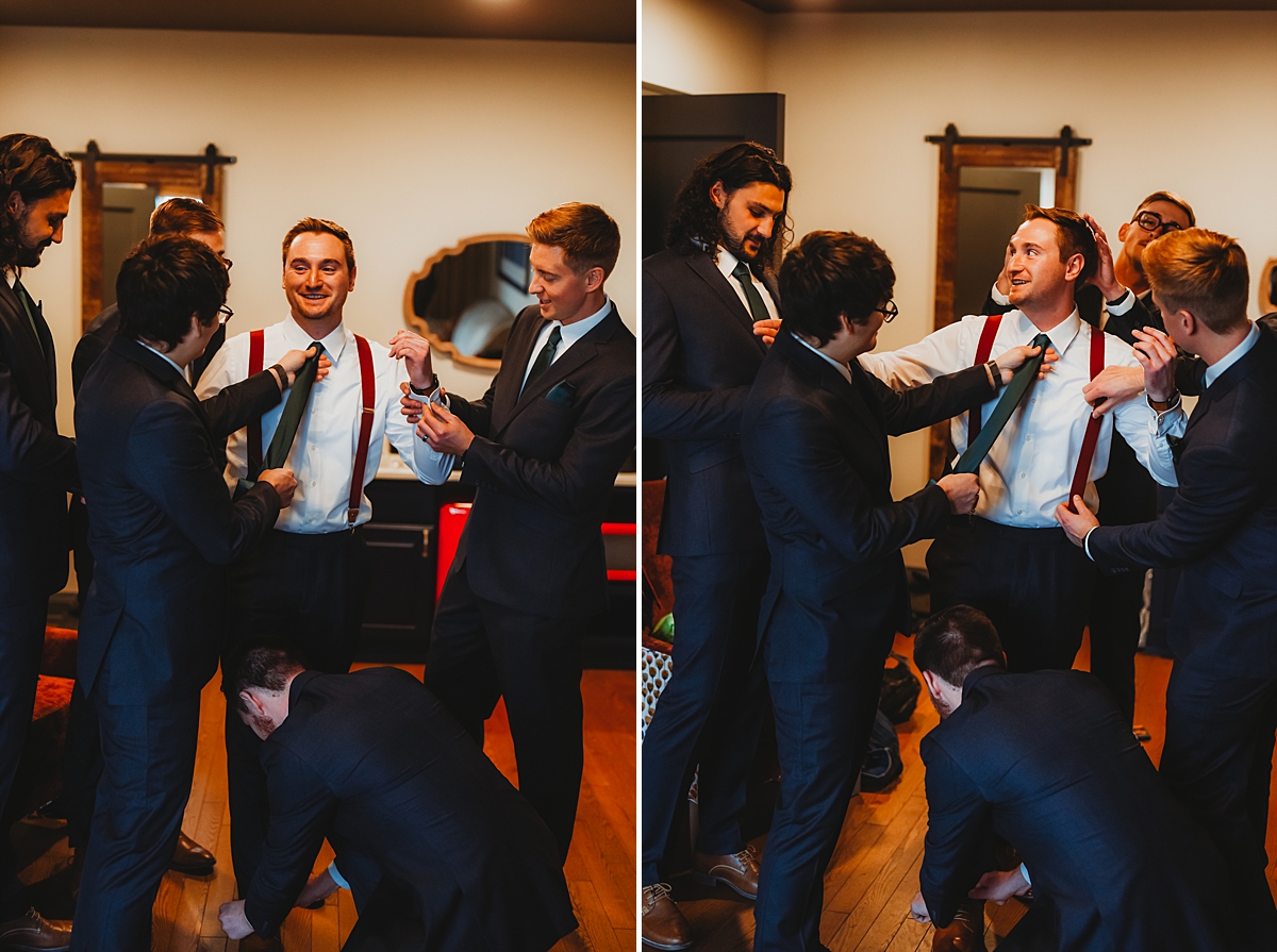 groomsmen helping groom get ready for kenosha wedding