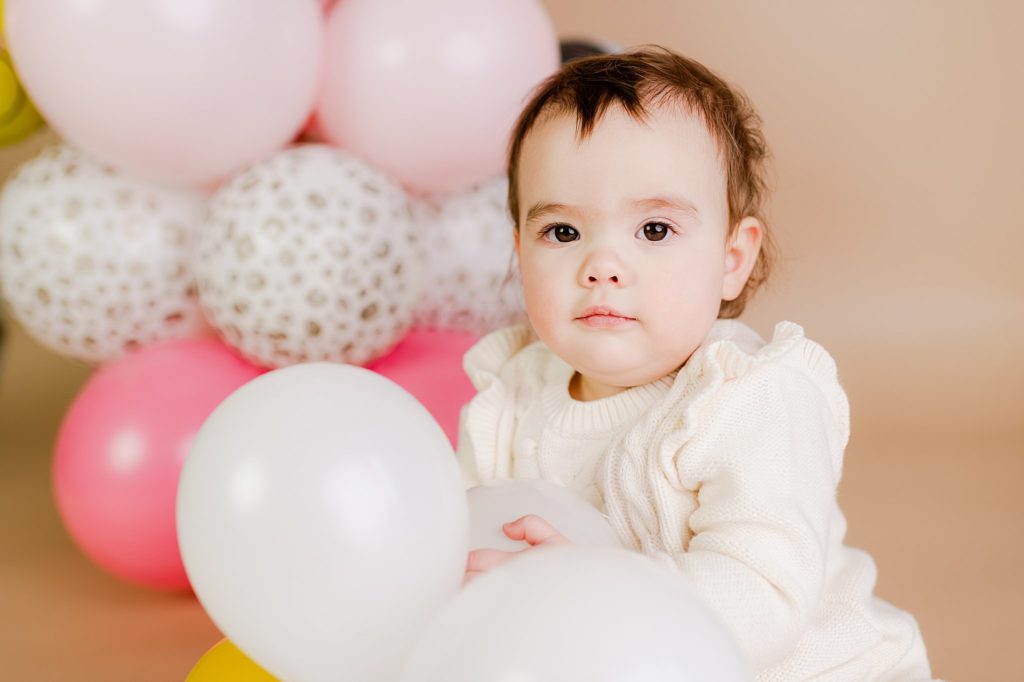balloon themed first birthday photo session