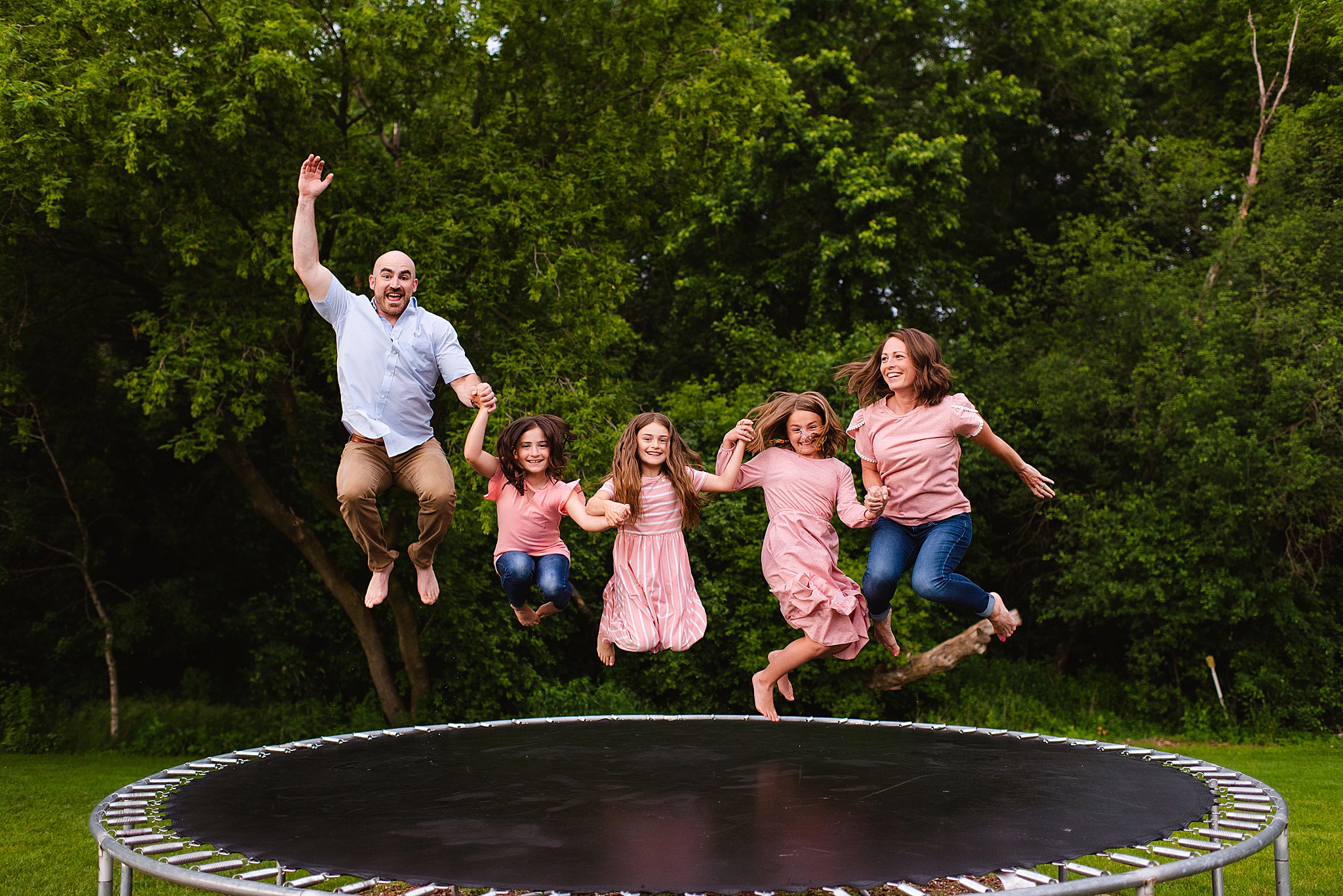 backyard family session with a trampoline