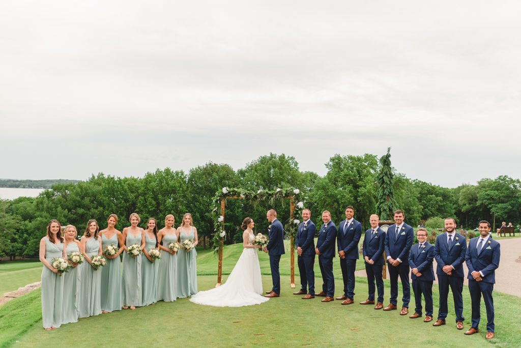 large wedding party in mint green and navy blue madison wedding photographer