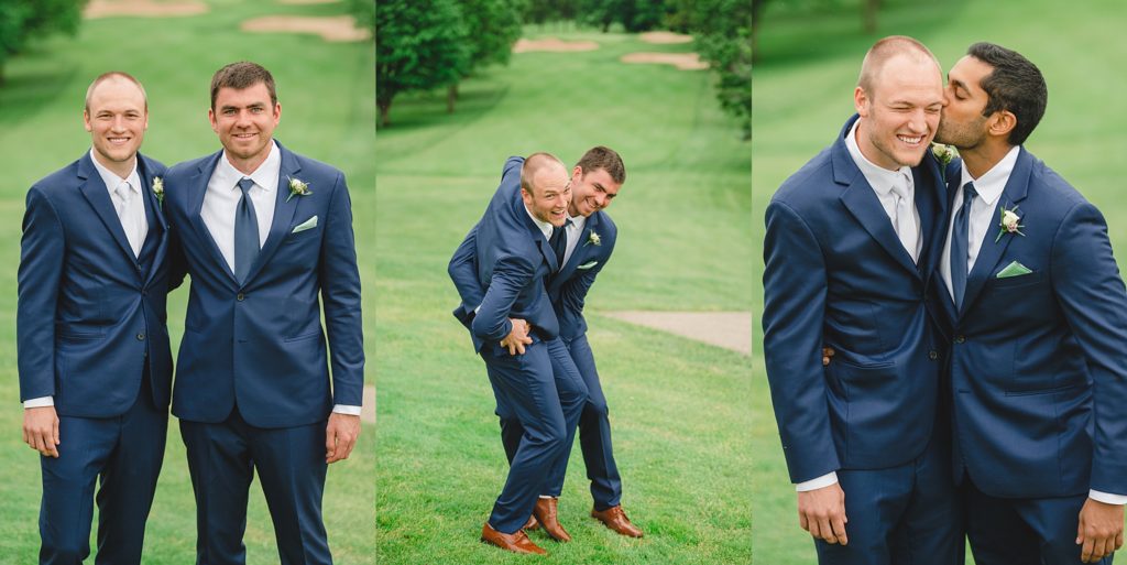 large grooms party wearing navy blue suits from mens wearhouse