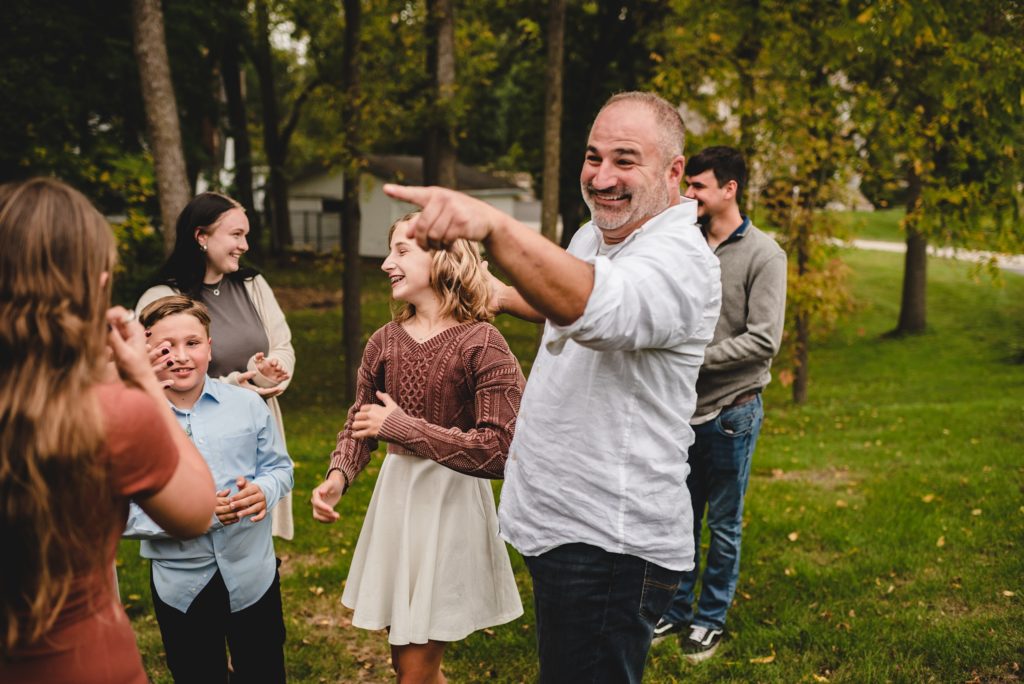 blended family celebrating surprise proposal