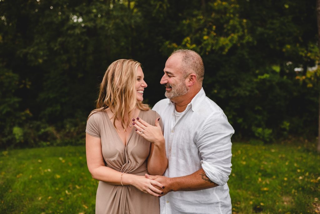 blended family celebrating surprise proposal