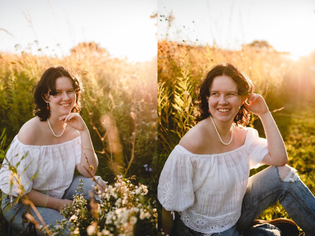 senior girl next to golden field of summer weeds