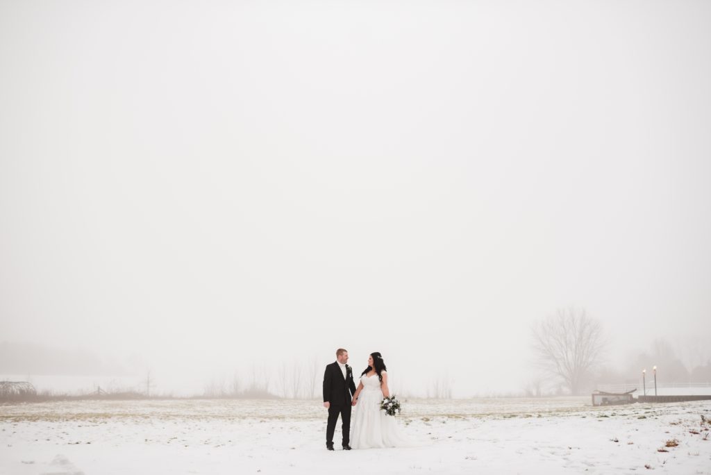 Winter Wedding at Rosewood Delavan in December with snow