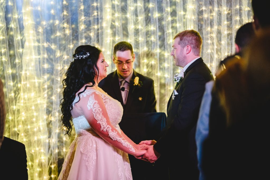 indoor wedding ceremony at the rosewood in delavan wisconsin
