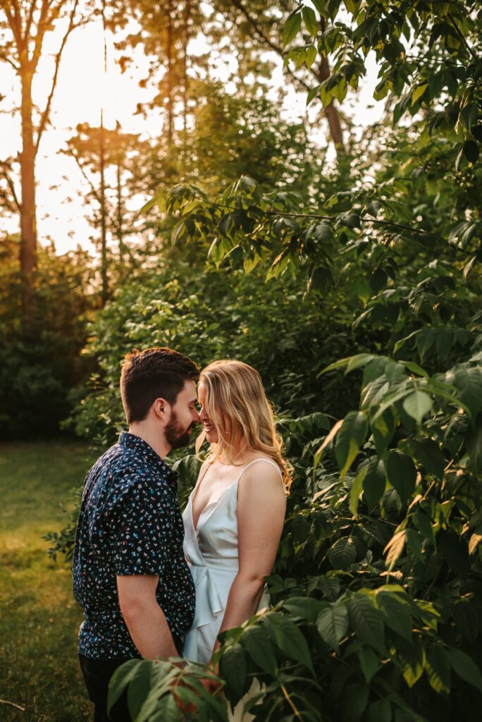 engaged couple kissing romantically