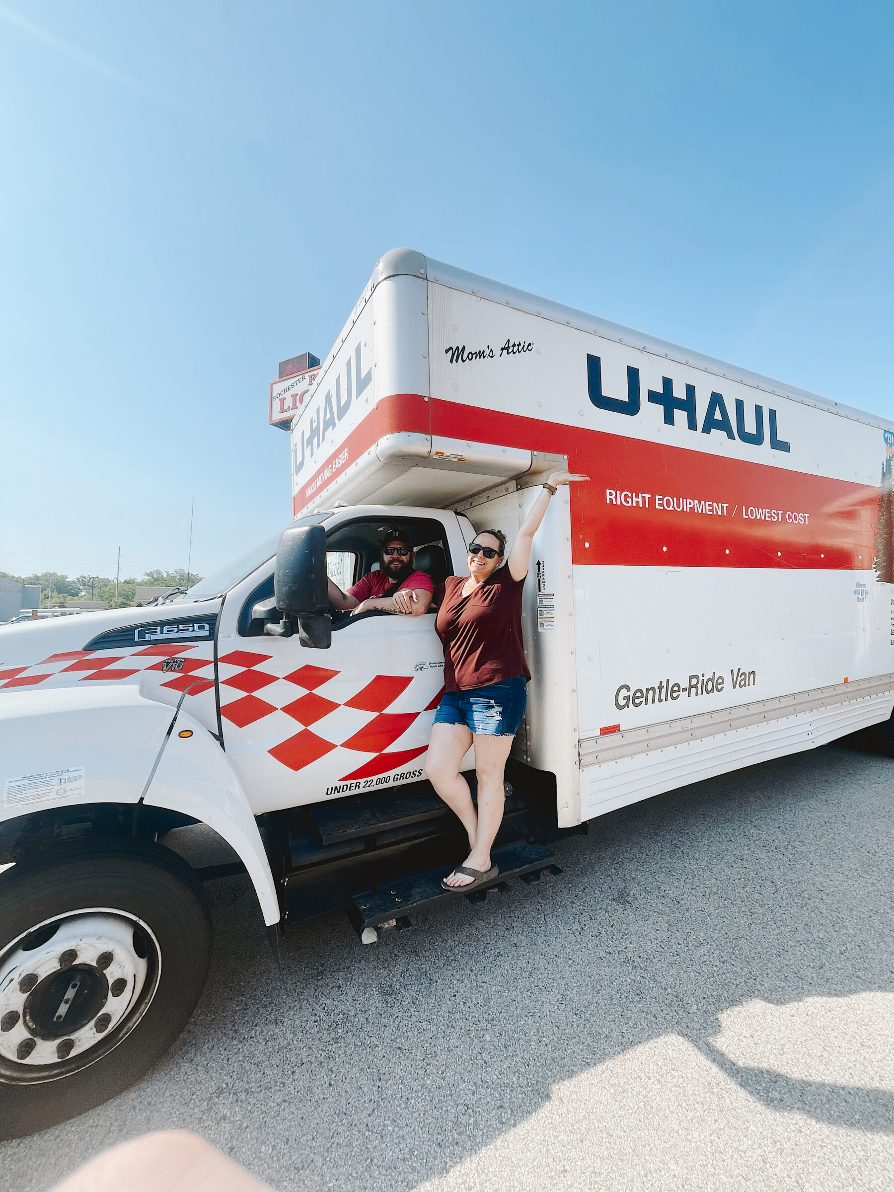 Happy couple with a Uhaul truck