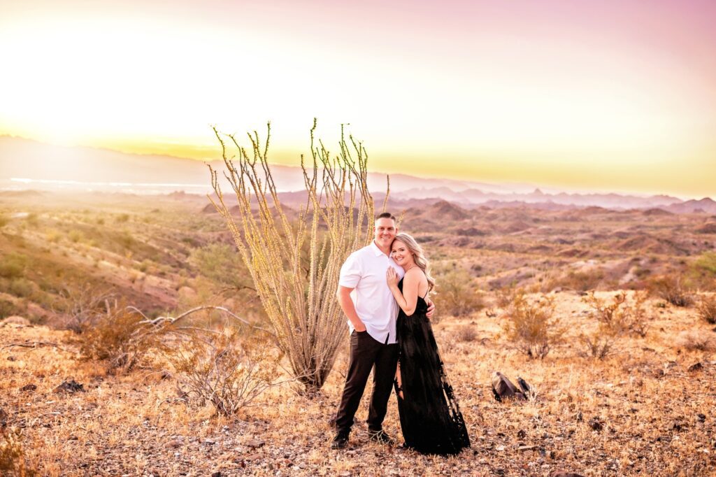 engagement photos in the desert with a mesquite bush
