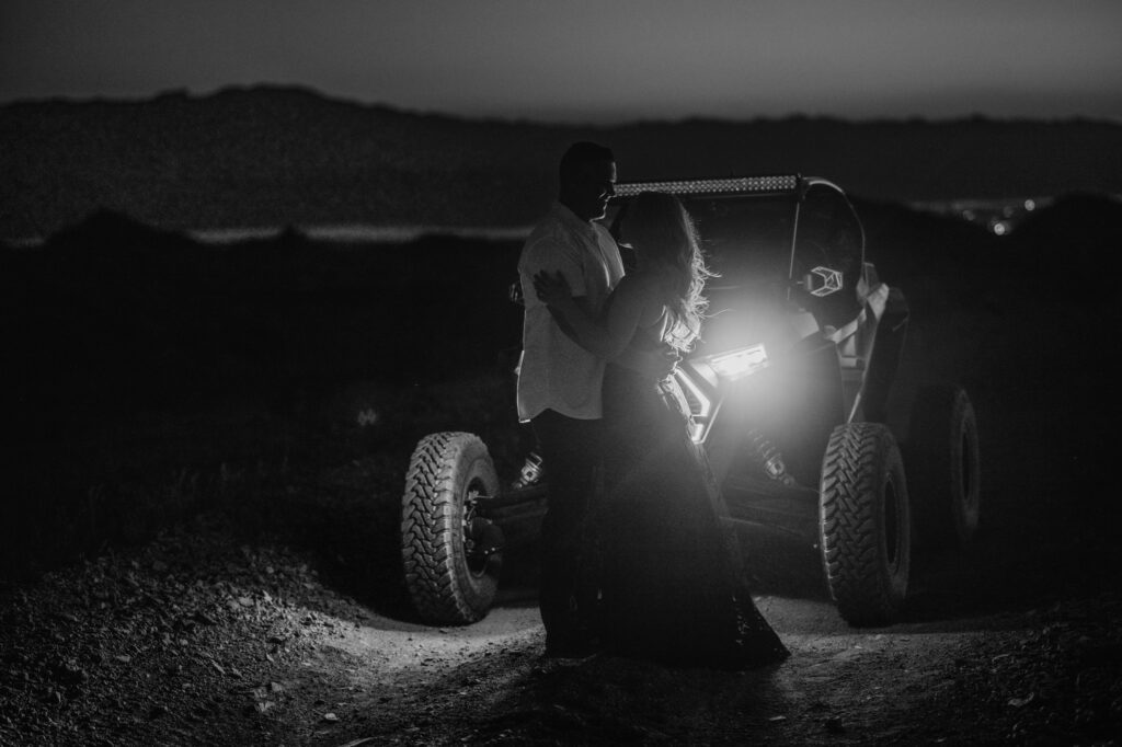 nighttime engagement photos offroading in the desert with polaris razr lake havasu city