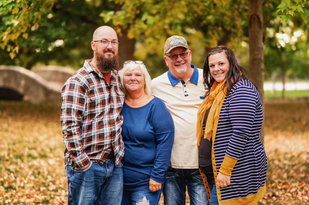 adult children with parents at family photo session