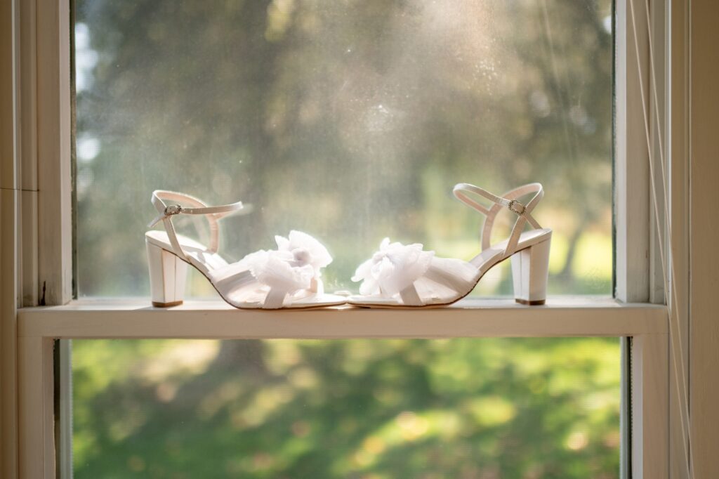 wedding heels on a window sill