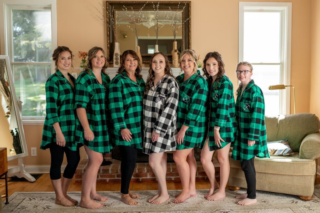 bridesmaids in green and black plaid matching pajamas
