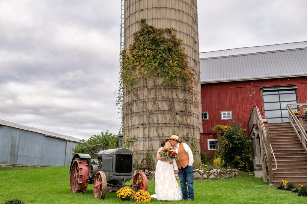 fall country wedding portraits with an old tractor