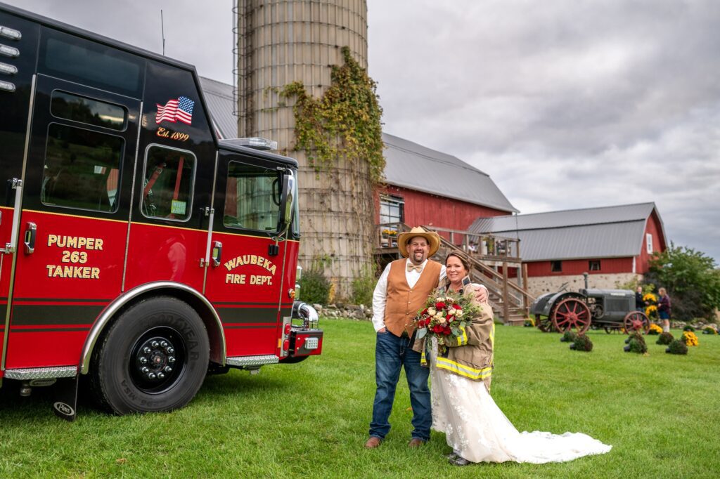 firefighter wedding with a fire truck