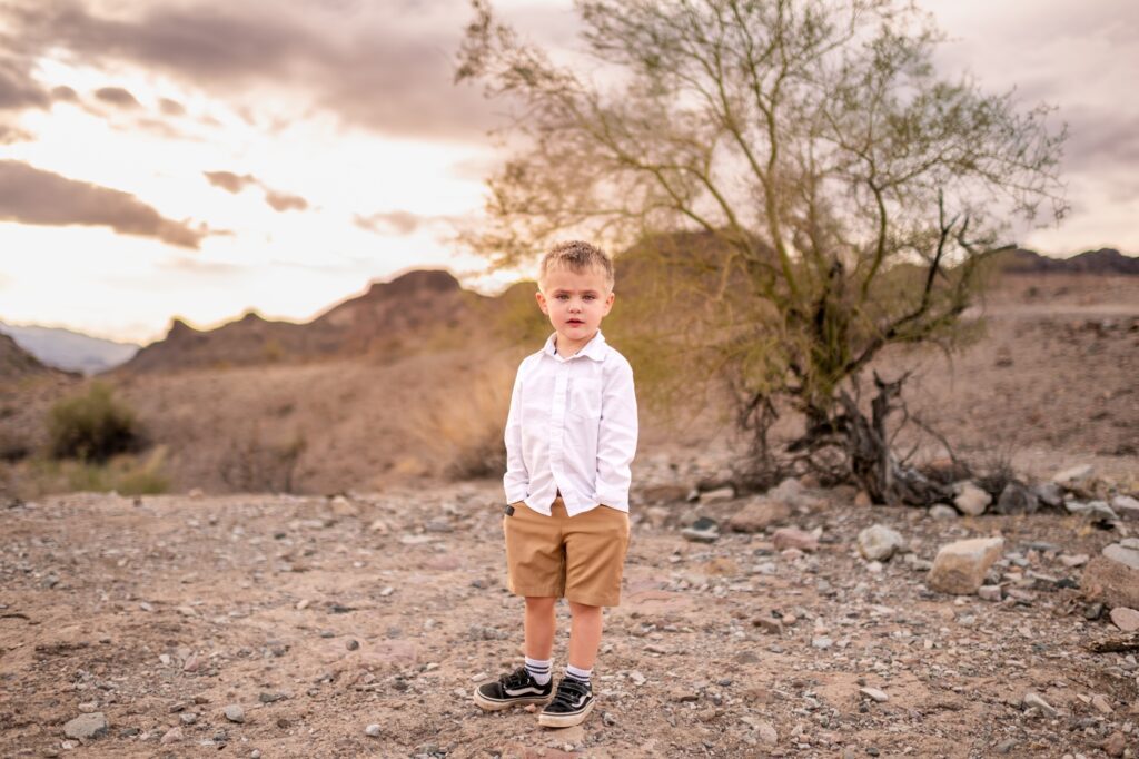 little boy in the arizona desert for family photos