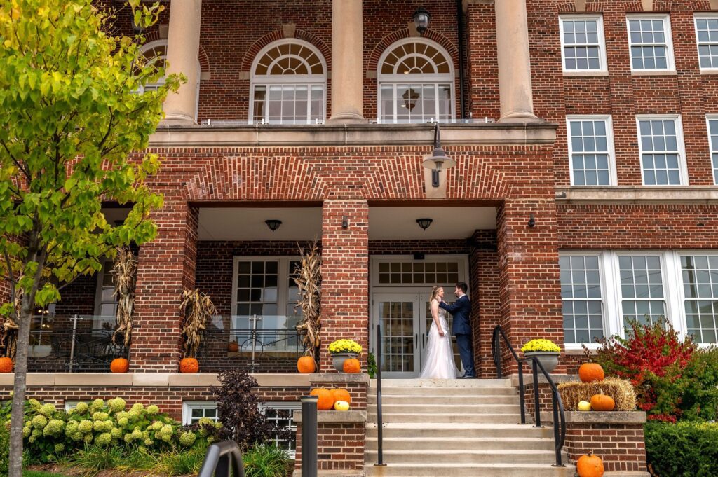 first look on the steps of the stella hotel for wedding