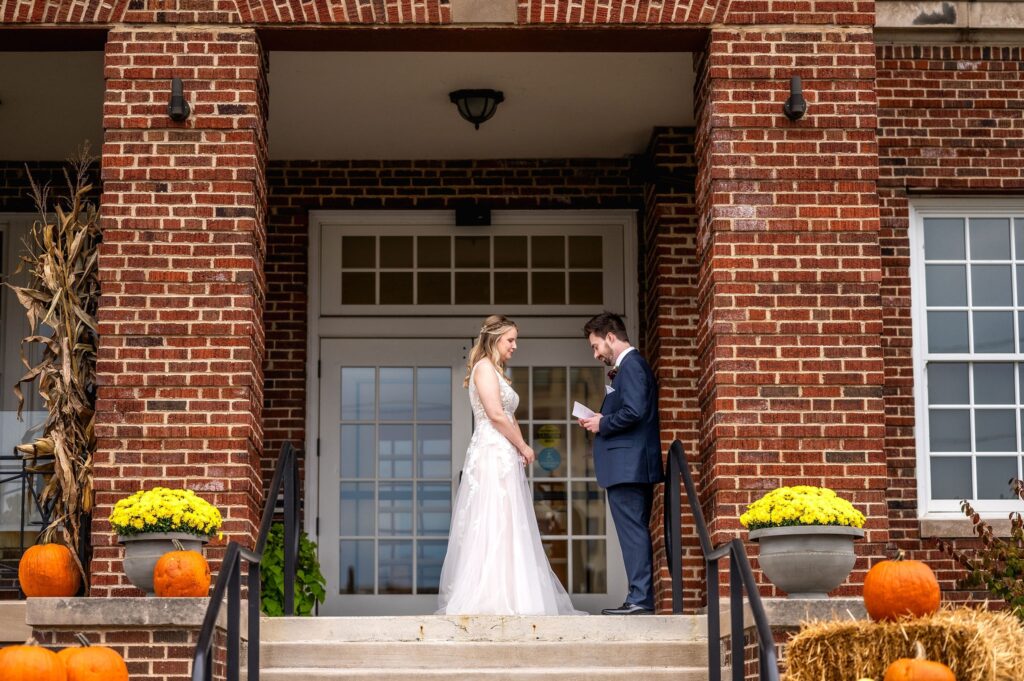 first look on the steps of the stella hotel for wedding