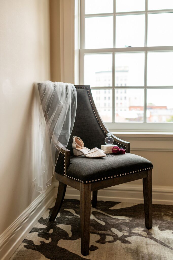 bridal details on a gray chair