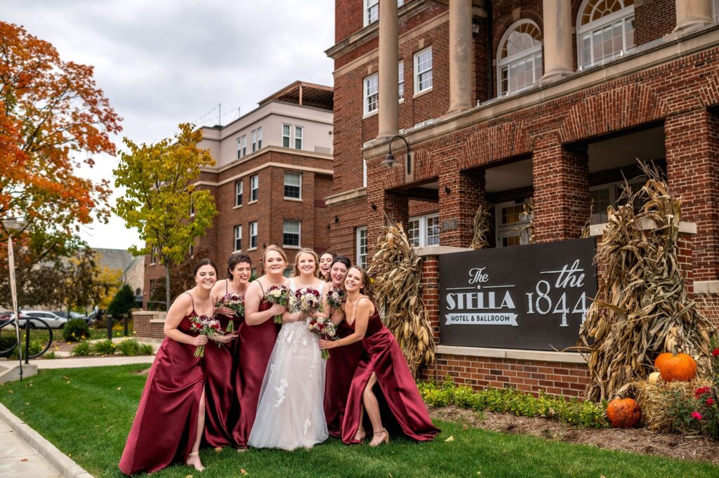 wedding party photos in front of the stella hotel