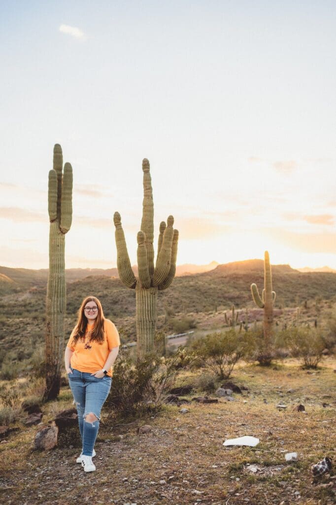 senior photos in the desert with saguaros