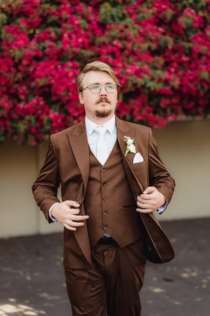 groom in brown suit