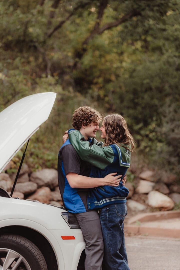 high school senior couples photos in letterman jackets
