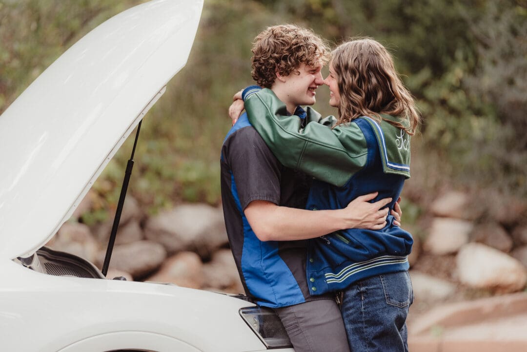 high school senior couples photos in letterman jackets