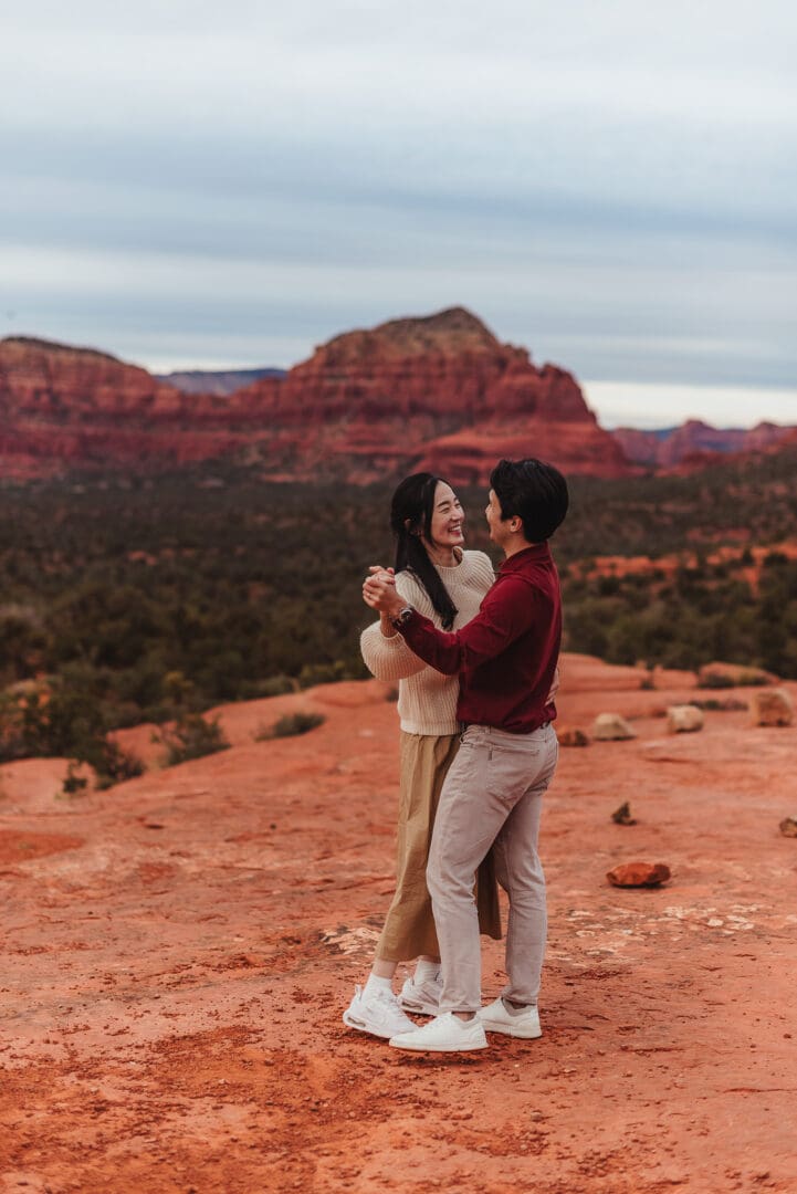 mom and dad dancing together during family session