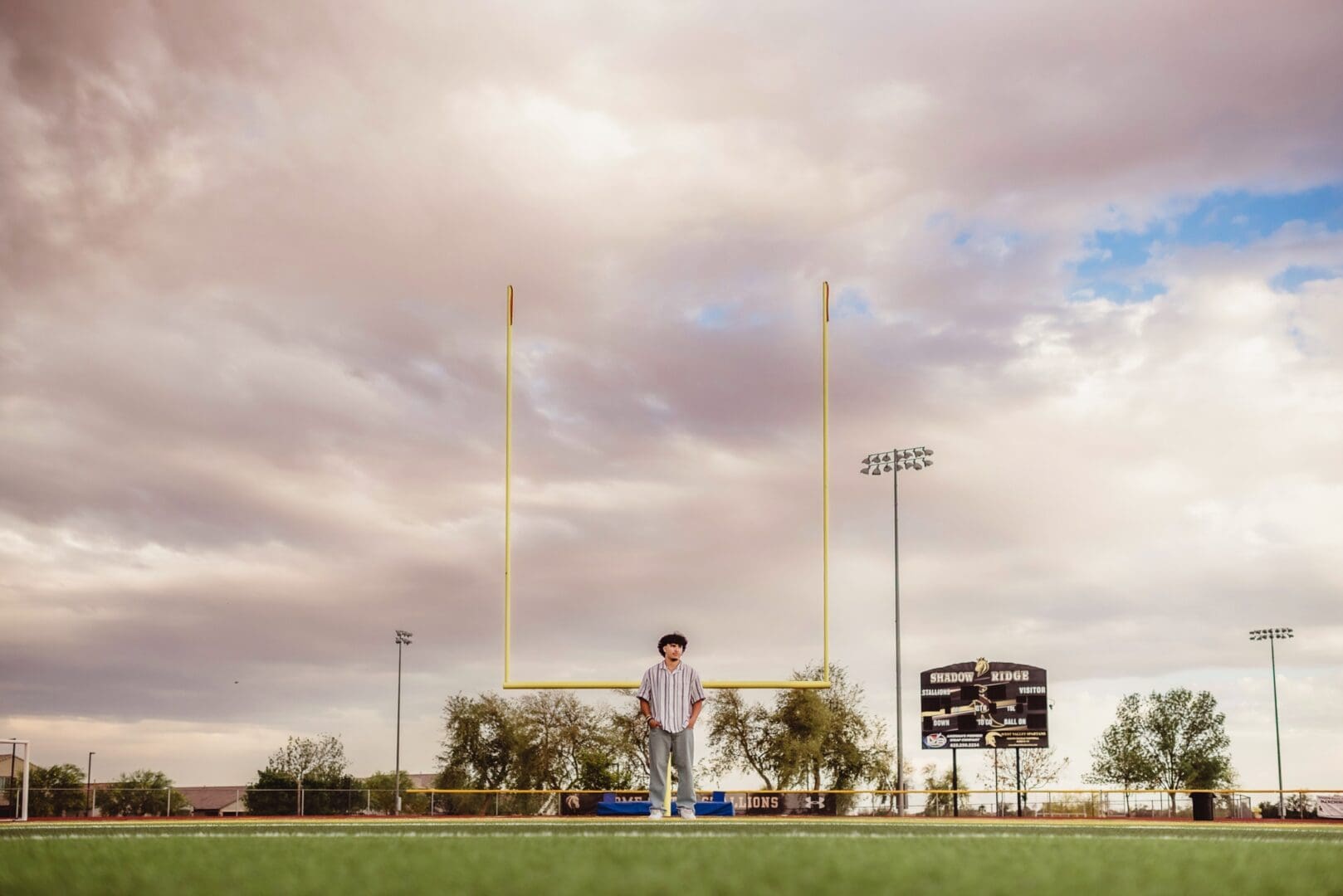 senior football player photos on the field