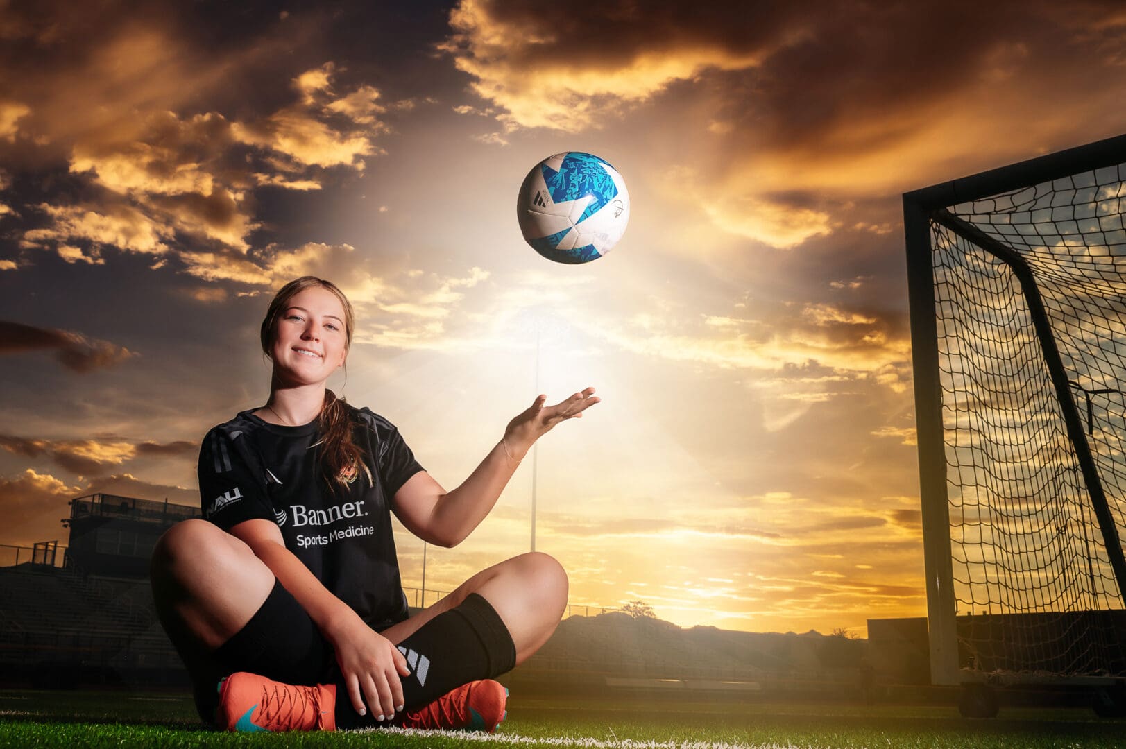 soccer player tossing ball 