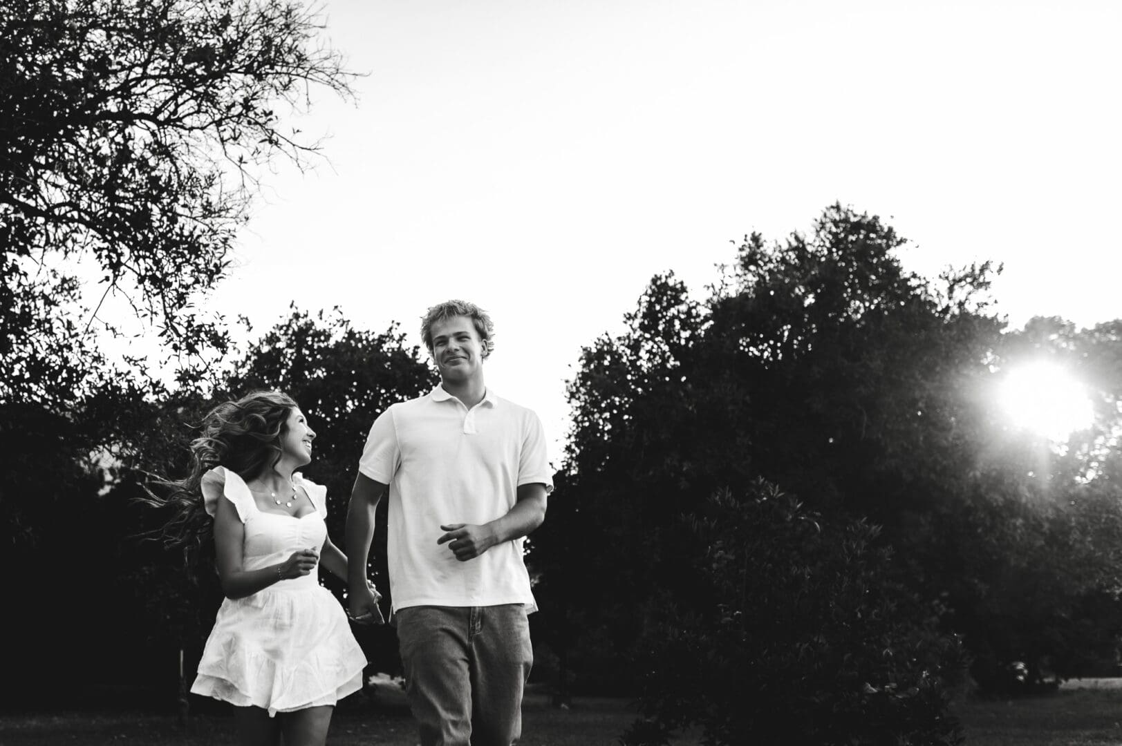 teenage sweethearts running together