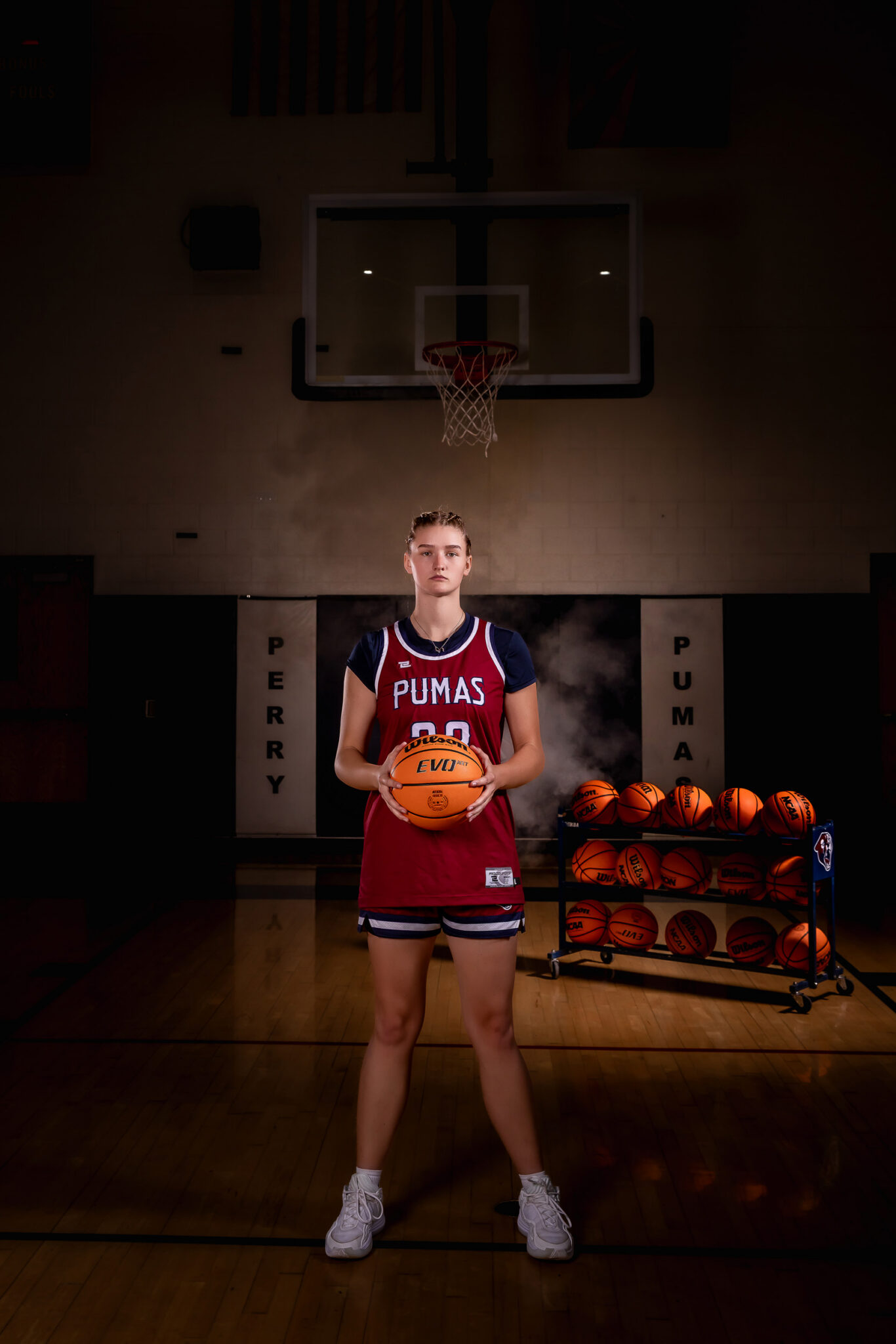 Perry High School senior basketball player posing on the court in Gilbert, Arizona