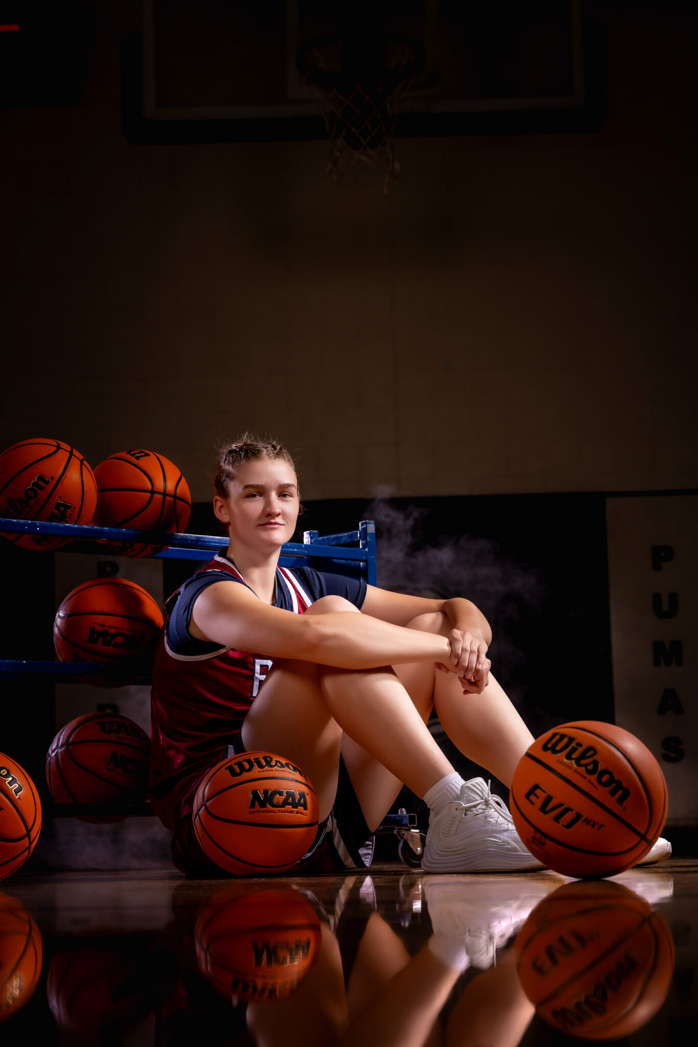 Girls basketball athlete photographed on her home court in Gilbert, Arizona
