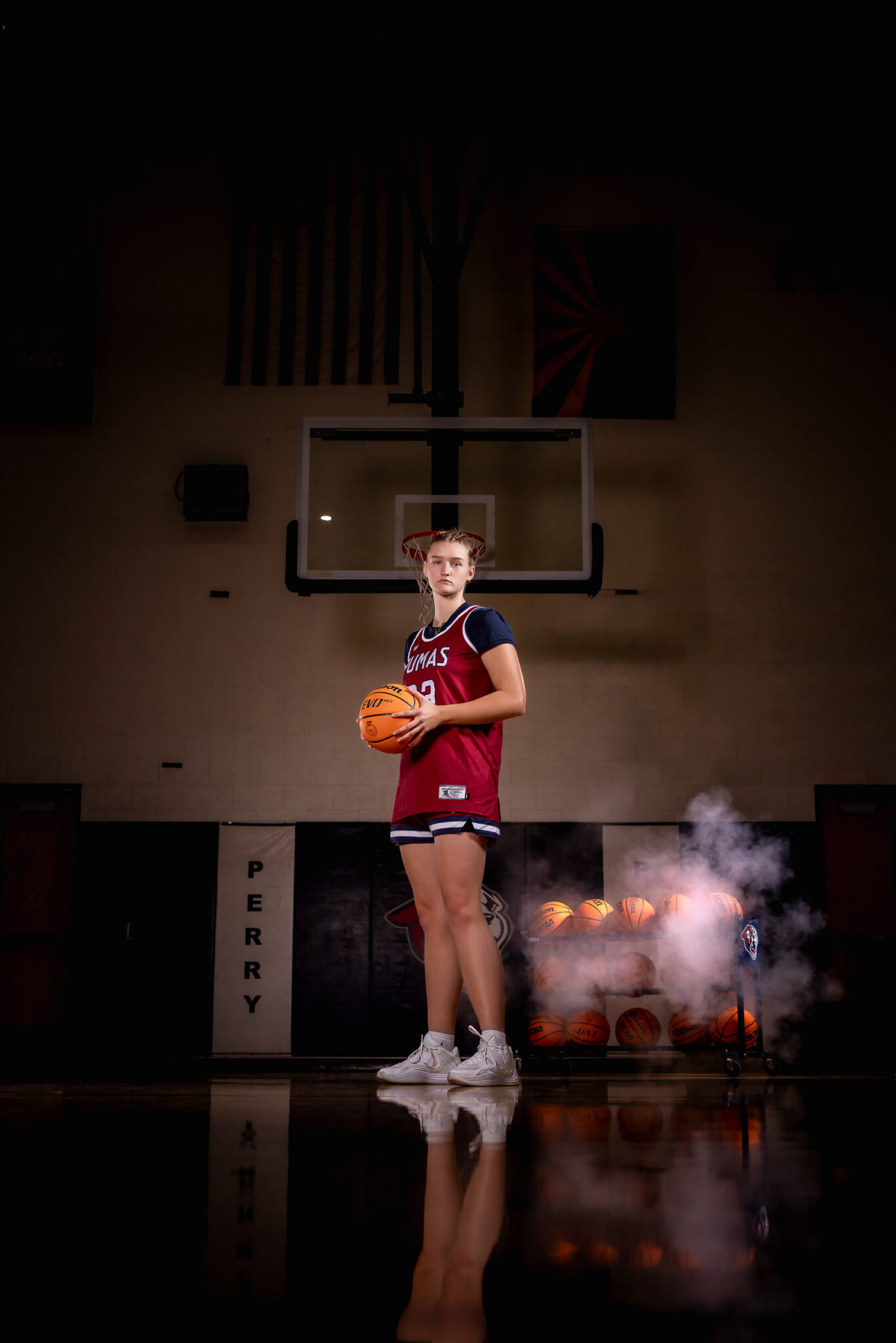 Dramatic girls basketball sports portrait of a Perry High School senior in Gilbert, AZ