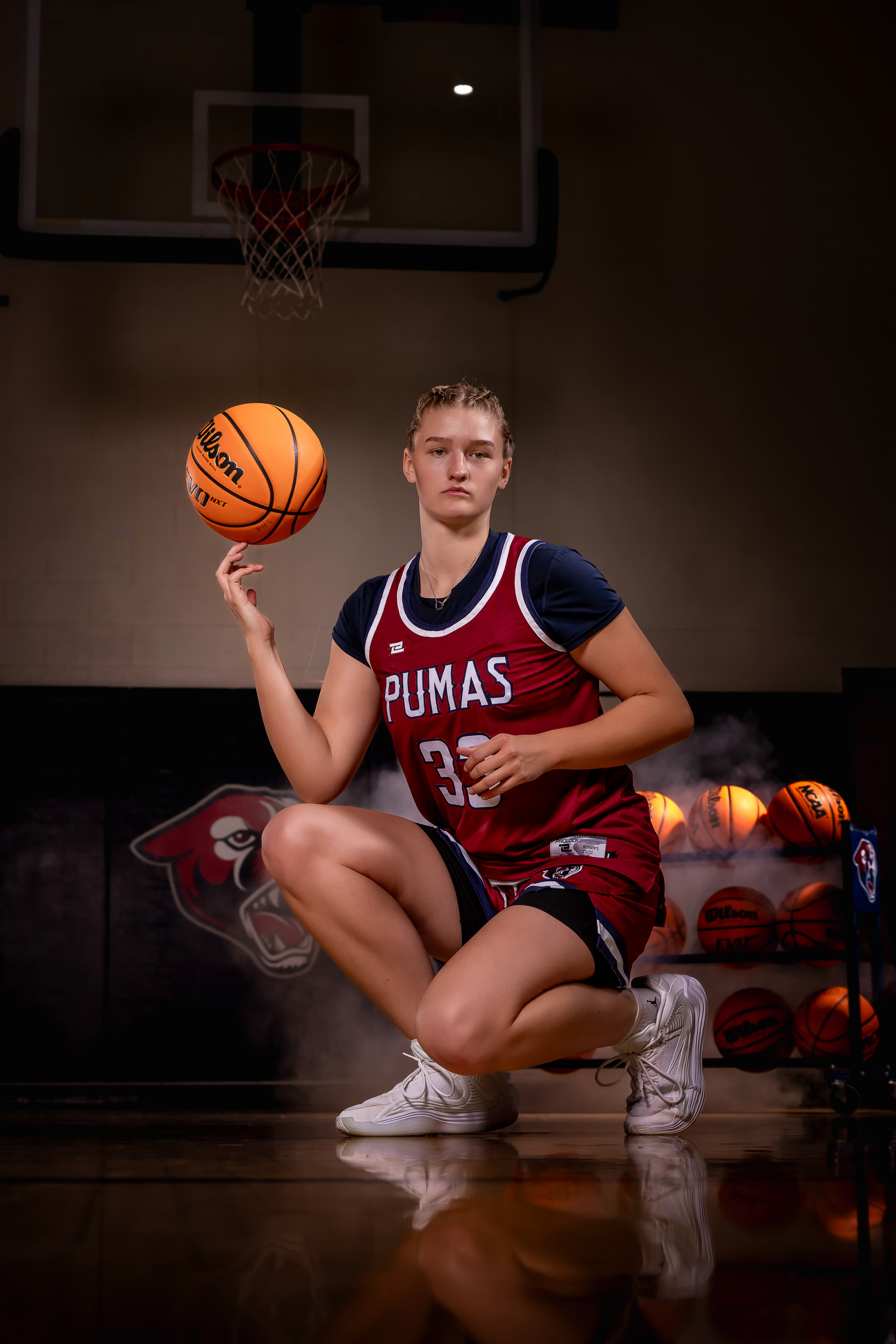 Close-up portrait of a high school girls basketball player during her senior session